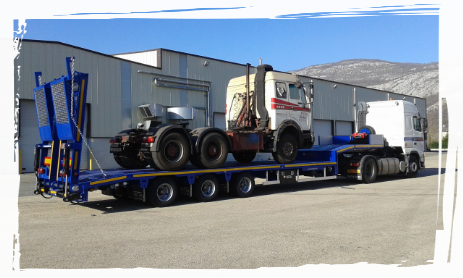 Traslado de tractora doble carro en Grues Farners
